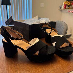 Black suede platform heels